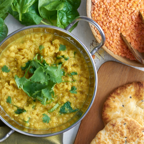 Dahl de lentilles corail aux épinards